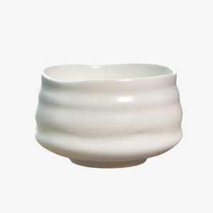 Matcha Union handmade white ceramic chawan with gently ridged sides and an uneven rim, for whisking and sipping matcha.